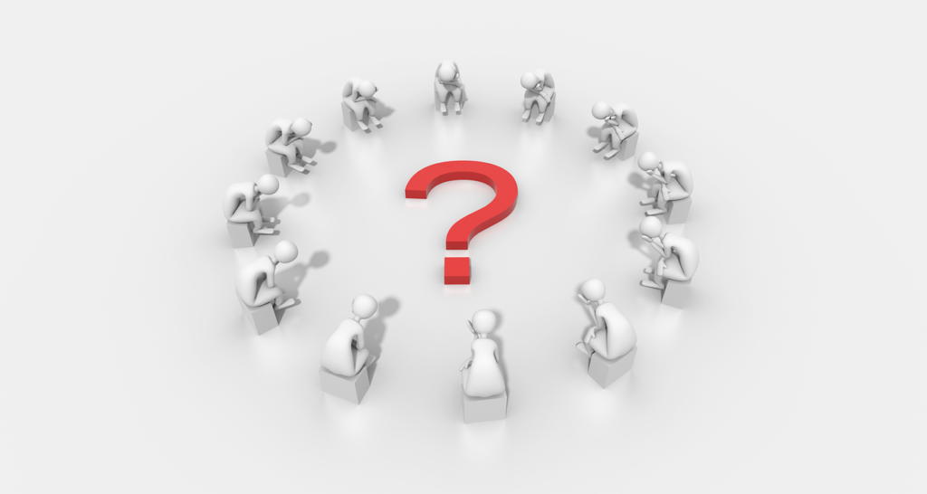 クエスチョンマークを囲む人